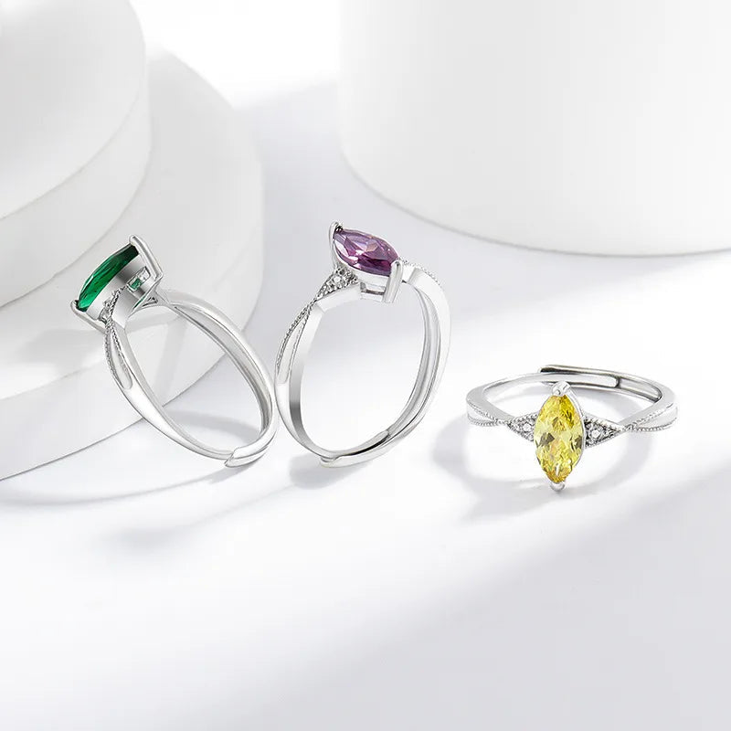 Bague argentée ajustable à pierre centrale marquise jaune, monture pavée
