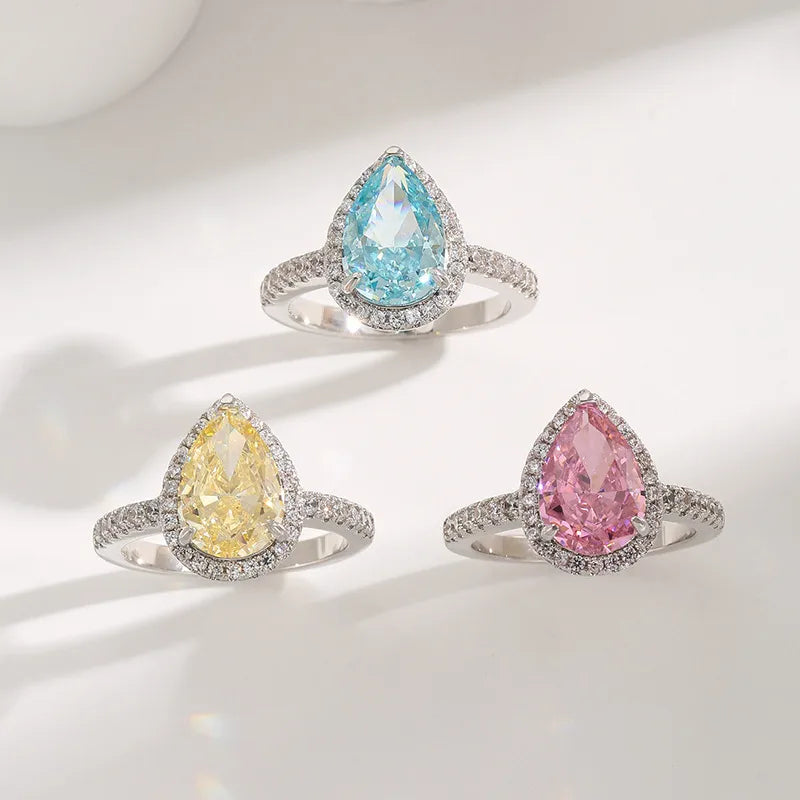 Bague solitaire goutte en acier argenté, pierres bleu, jaune et rose