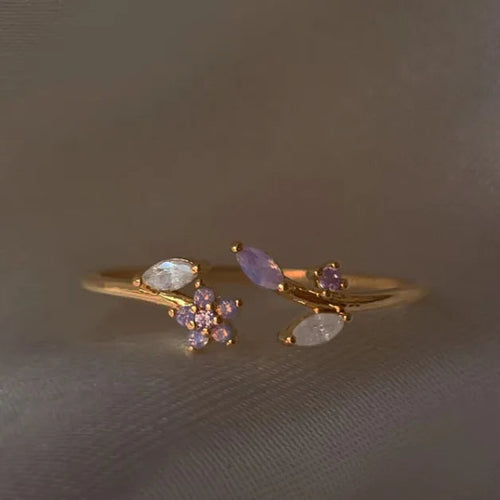 Bague ajustable dorée avec fleurs et zircons violets sertis, motifs feuillage
