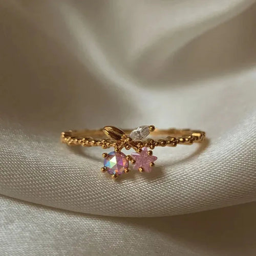 Bague réglable plaquée or 18K, motifs cerise et étoile, pierres roses