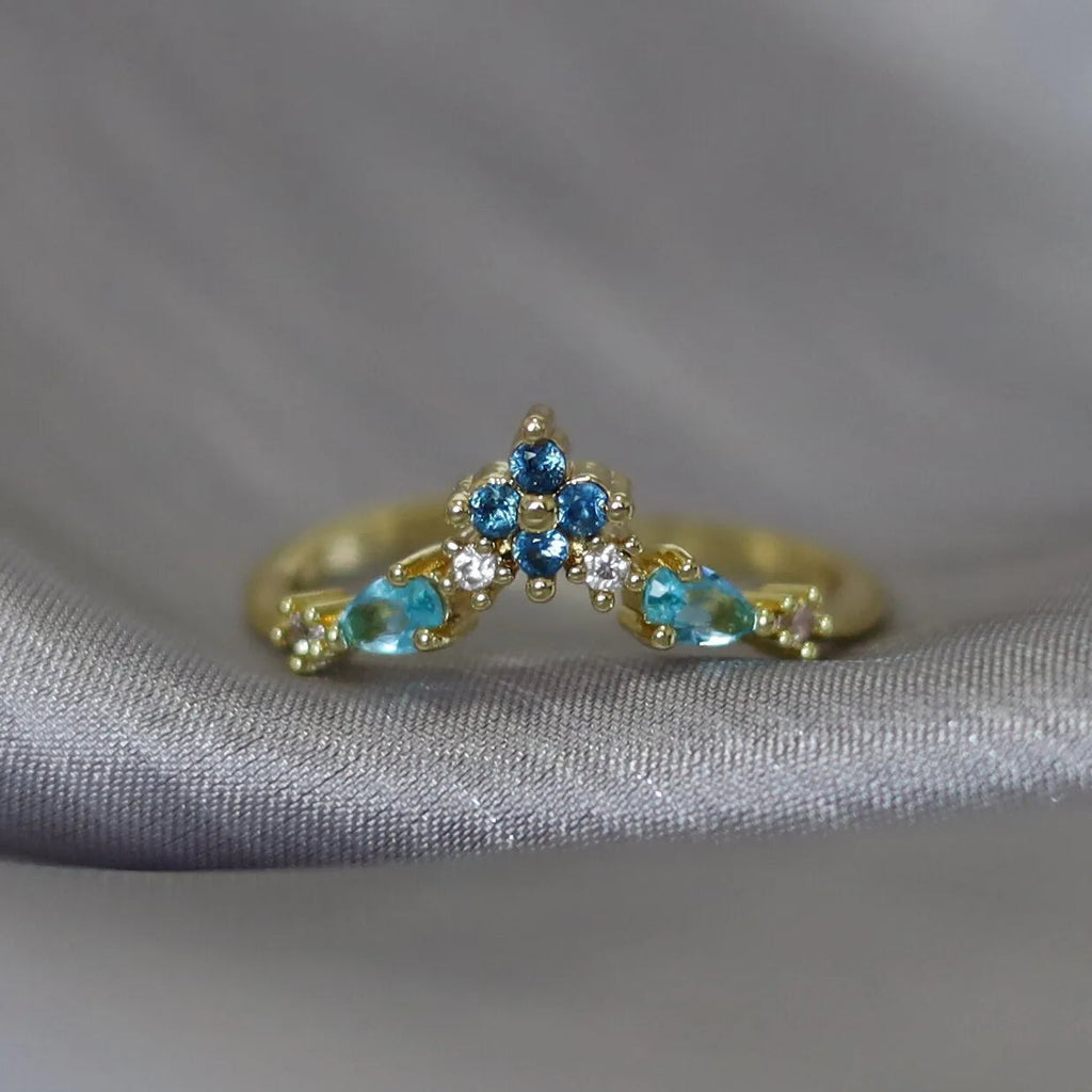 Bague en V plaqué or 18K, couronne, zircons bleus sur acier inoxydable