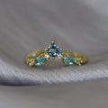 Bague en V plaqué or 18K, couronne, zircons bleus sur acier inoxydable