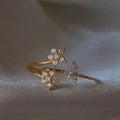 Bague ajustable plaqué or 18k, fleurs et papillons en zircons étincelants