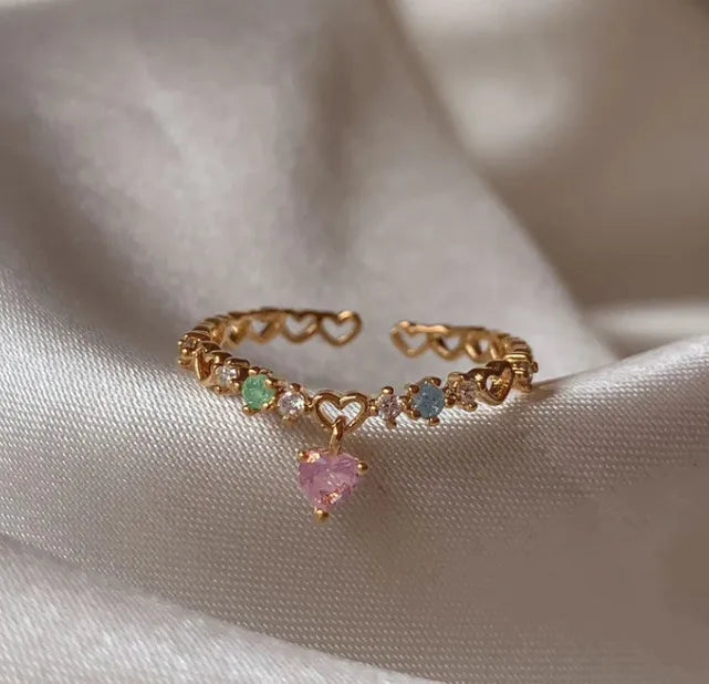 Bague ajustable dorée en acier inox, cœur rose et zircons colorés pendants