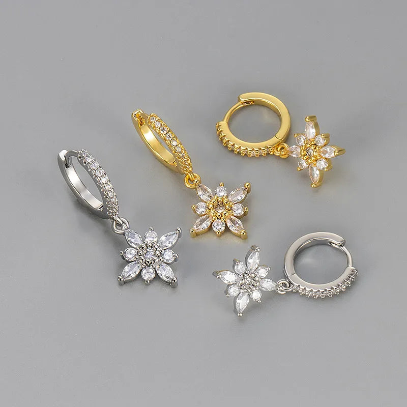 Créoles pendantes fleurs : anneaux avec zircons et motifs floraux scintillants