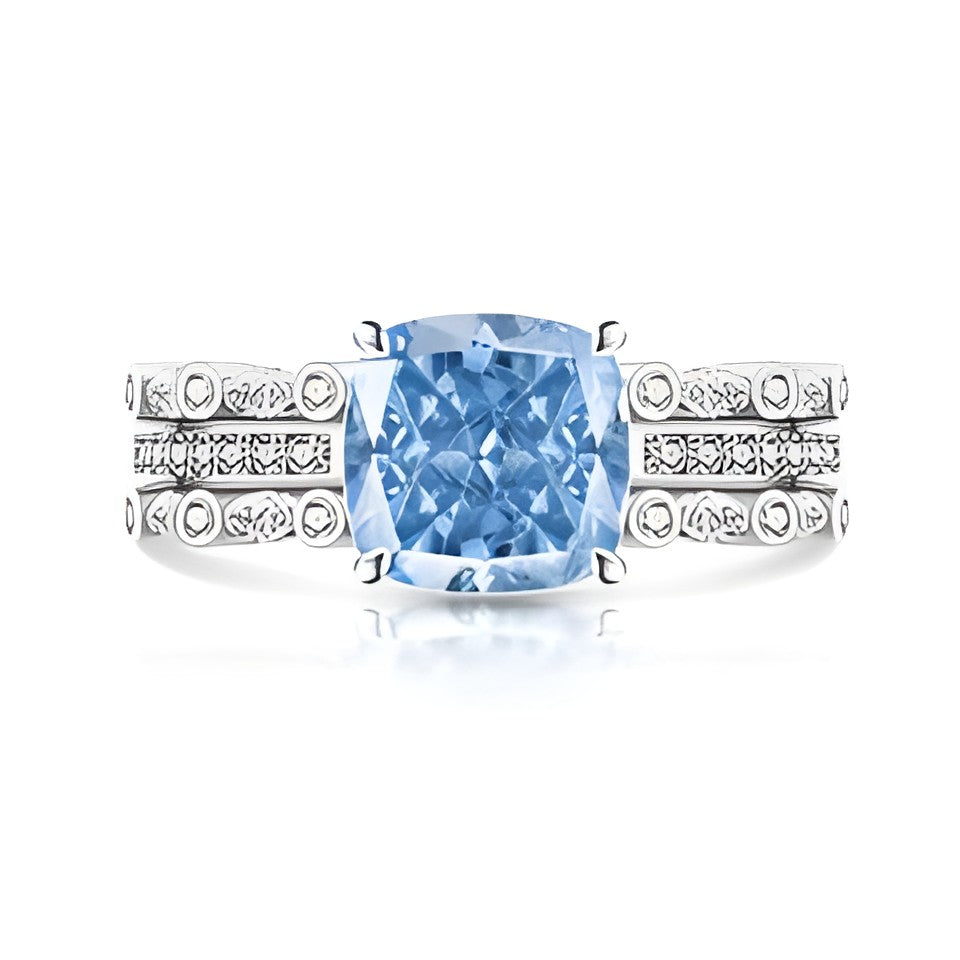 Bague ajustable en acier inoxydable argentée, pierre carrée bleue avec monture ornée.