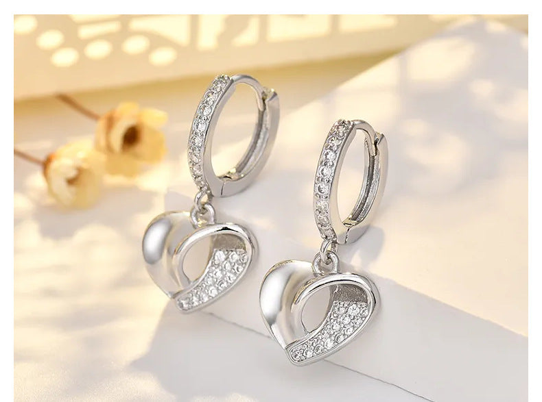 Créoles argent, anneaux sertis et pendentifs cœur pavés de zircons