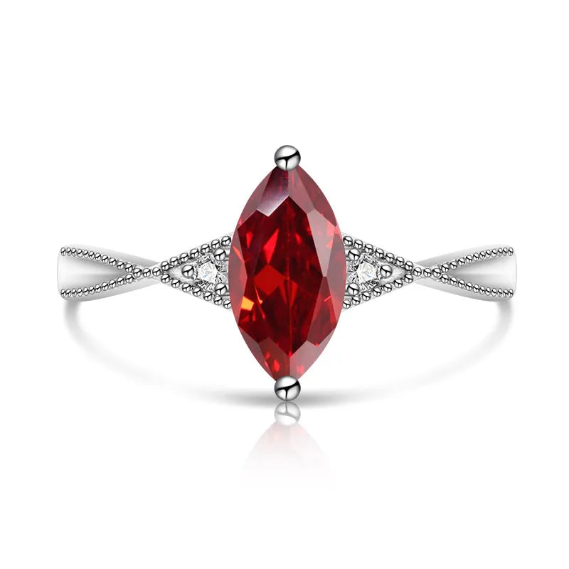 Bague argentée ajustable à pierre solitaire marquise rouge, monture pavée