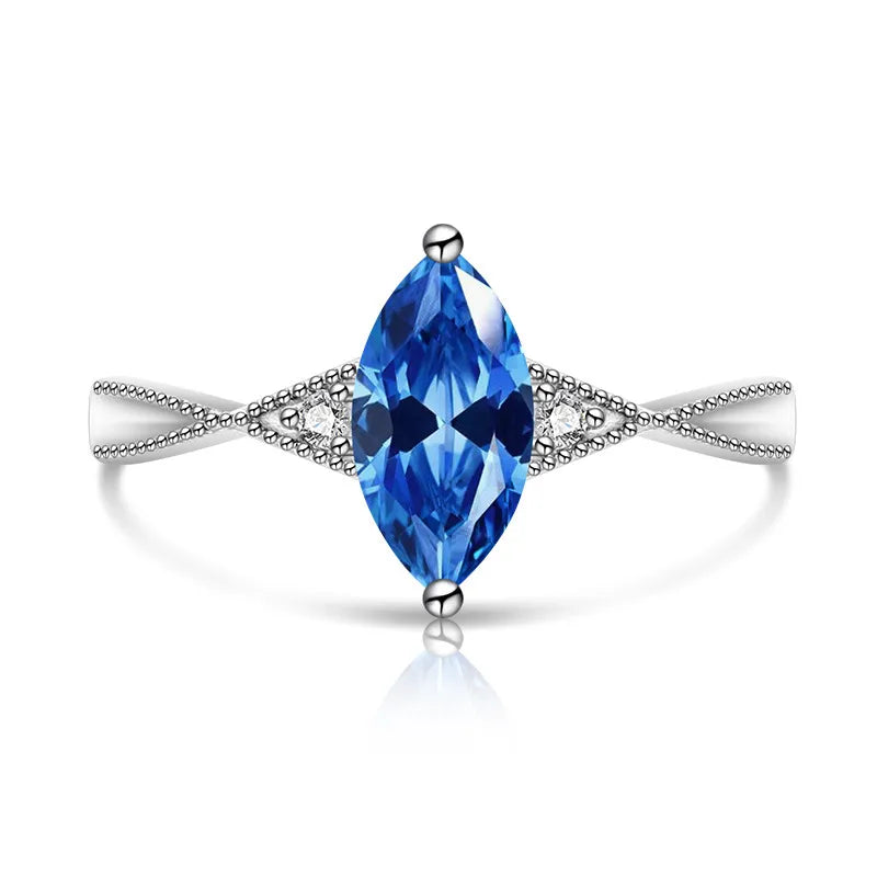 Bague argentée ajustable à pierre solitaire marquise bleue, monture pavée