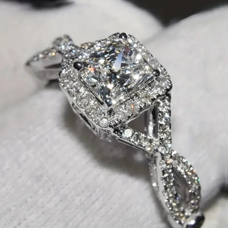 Bague solitaire carrée en acier argenté, halo de pierres, zircon clair, anneau entrelacé.