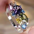 Bague fleurie multicolore argentée portée — zircons colorés bohème chic — Jewelry by Kitana